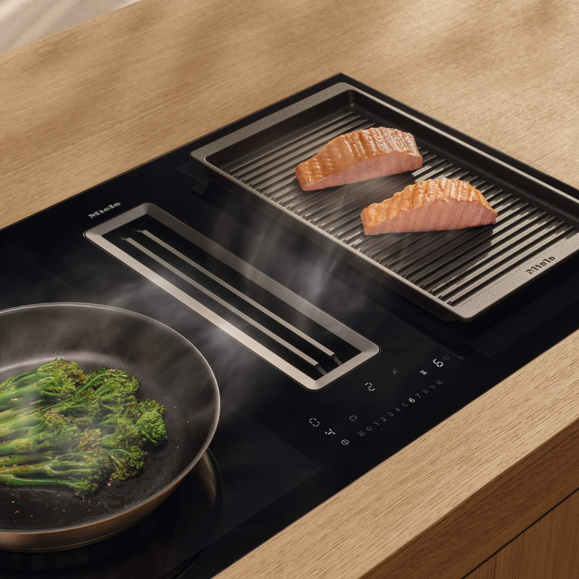 Miele-Induktionskochfeld-mit-Muldenluefter-und-Grill