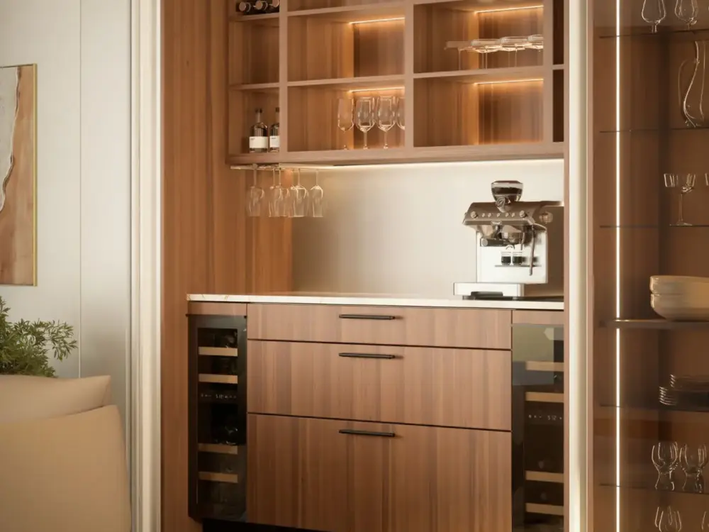 Häcker Kaffeestation hinter Pocket Doors in Walnuss